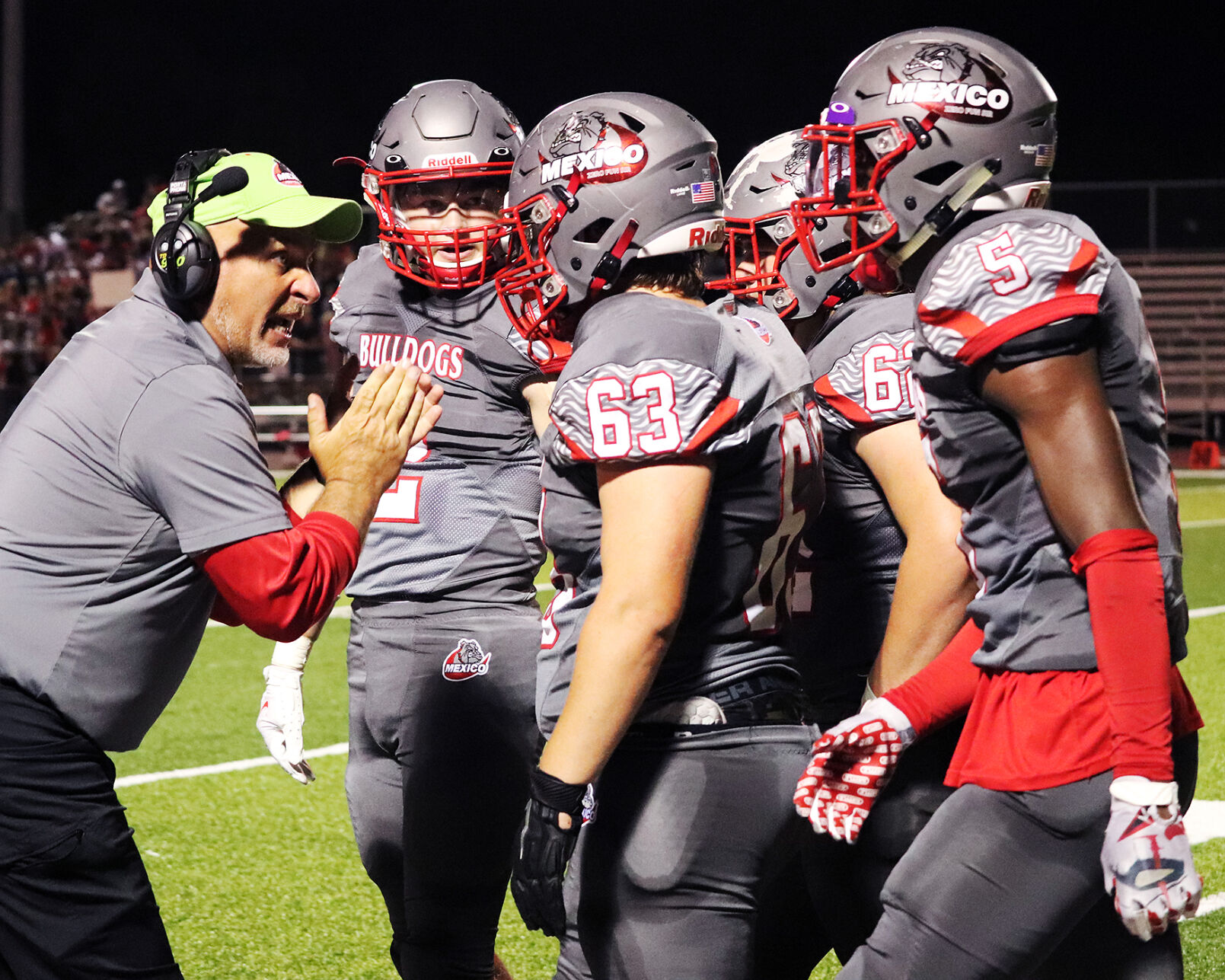 Assistant Coach Kenny Grub yells at a group of players on Friday